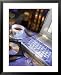 Laptop Computer, Cd-Rom, Cup of Tea, and Books Framed Art Poster Print by Eric Kamp, 25x31