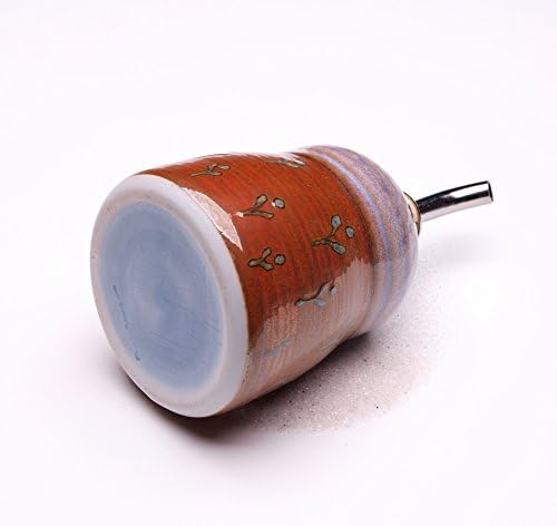 Vitreous true porcelain spring flowers themed decoration olive oil or condiment dispenser. Handmade by Mike Hays on the wheel. 3.25 in. dia., 4.5" tall without pourer, @10 oz. volume.