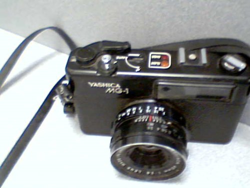 Yashica MG-1 fixed lens 35mm Rangefinder w/Yashinon 45mm 1:2.8 Lens (Japan) (Black COlor 35mm Film Camera)