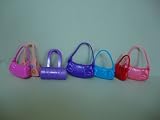41vyCMFl%2BzL._SL160_ A set of seven different colors and styles Purses. Made to Fit the Barbie doll