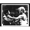 Photo of Larry Bird & Julius Erving Fighting