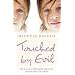 Touched by Evil: The True Story of the Psychic Powers That Saved Me from a Life of Abuse