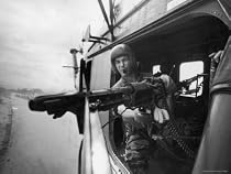 Crew Chief Lance Cpl. James C. Farley Manning Helicopter Machine Gun of Yankee Papa 13 Photographic Poster Print by Larry Burrows, 24x18