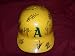 2010 Oakland Athletics Team Autographed Yellow Full Size Batting Helmet with 27 Signatures Total, Proof Photos of the Athletics Signing for Us.