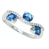 0.99Ct Blue Topaz and Diamond Three Stone Ring in 14Kt White Gold