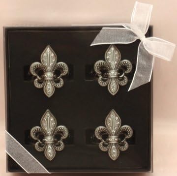 Unique fleur de lis pewter napkin rings in the beautiful fleur de lis collection. Each is ~2" in diameter. All four rings are of same designs. Great for a housewarming gift or home collection. Made of pewter and adorned with Czech rhinestones. Packaged in black deluxe box with organza white ribbon.