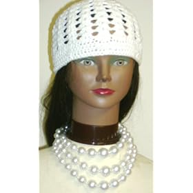 Click here to buy Three Strand White Cultured Graduated Simulated Ivory Pearl Separated By Small Silver Beads Short... by Gita.