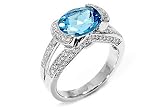 18Kt White Gold Genuine Oval Shape Blue Topaz Split Shank Diamond Ring