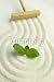 Wallmonkeys Peel and Stick Wall Decals - Green Leaf on Raked White Sand of a Zen Garden - 24"H x 16"W Removable Graphic