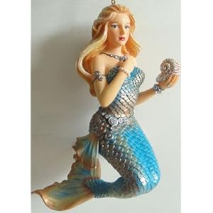 December Diamonds Elegant Gorgeous Capricorn Mermaid Ornament ...Long Blond Glittered Hair Blue & Gold Strapless Dress with Rhinestones Belt "closure" Rhinestone NecklaceRhinestone"... Ring on Both Hands & Rhinestone Bracelet...This Beauty Holds a Seashell. Amazing!!!!..Lots of Bling!!!
