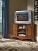 Home Styles Country Casual Corner Entertainment TV Stand in Distressed Oak Finish