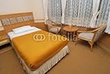 Wallmonkeys Peel and Stick Wall Decals - Single Bed in Modern Hotel Room with Table and Chairs - 72