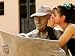 Girl in Quincinera (15th) Birthday Dress Whispering to Statue, Plaza Del Carmen, Cama...