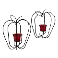 Apple shapped iron sconces with red votive glass