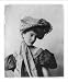 Historic Print (M): [Young woman modeling: Half lgth., 2 long pieces of material draped from hat over body]