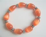 Orange Teardrop Soothing Stretchable Bracelet Light & Dark Shade Orange Cat Eye Teardrio Jewelry w/ Daisy Spacing Beads Bracelet (BRAND NEW)