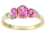 10KT 1.20CTW LAB CREATED PINK SAPPHIRE WITH DIAMOND ACCENT RING