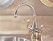 Franke Triflow Series TFT409 Traditional Triple Lever Gooseneck Filtration Faucet with Built-In Filtration System & Side Sprayer: Polished Chrome/NuBrass
