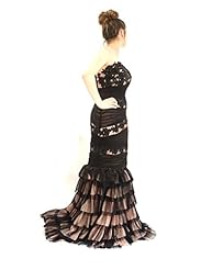 Material: Tulle 
Dress Silhouette: Mermaid  
Shoulder: Strapless  
Skirt: Mermaid 
Embellishments: Tiered  
Size Category: Adult 
Dry Clean