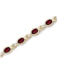 14K Yellow Gold Oval Garnet and Diamond Bracelet by Jewelry Mountain