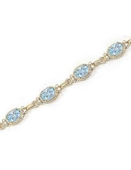 14kt Yellow Gold Oval Aquamarine Bracelet.