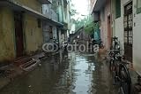 Wallmonkeys Peel and Stick Wall Decals - Flooded Street in Chennai Rain - 36"W x 24"H Removable Graphic