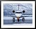 Aircraft at Jackson Hole Airport Surrounded by Snow-Covered Fields and Hills, Jackson...