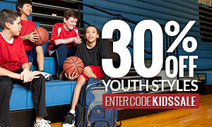 Group of young Teens sittiing in basketball gym wearing Russell Athletic Youth Apparel