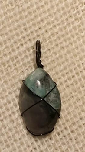 GENUINE BICOLORED EMERALD 30 Carats t.w. Pendant