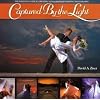 Captured by the Light: The Essential Guide to Creating Extraordinary Wedding Photography