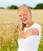 Wallmonkeys Peel and Stick Wall Decals - Happy Young Woman Showing Thumbs up at a Field - Removable Graphic