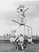 Motorcycle Acrobat Troupe Called The Promenade Percies Practise Their Act Involving Balance Photographic Poster Print, 12x16