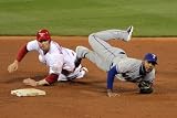 Texas Rangers v St Louis Cardinals, St Louis, MO - Oct. 27: Elvis Andrus and Matt Holliday Photographic Poster Print by Doug Pensinger, 16x24