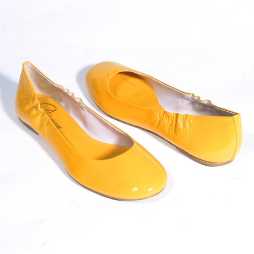 Click here to buy Delman 'Mona' Patent Flat (Citrine) by Delman.