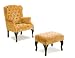 Accent chair in oak finish, upholstered in a floral pattern with fluted legs