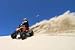 Teen Riding Atv in Sand Dunes Making a Turn in the Sand - 24"W x 16"H - Peel and Stick Wall Decal by Wallmonkeys