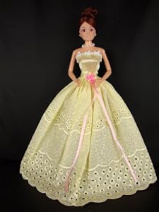 A Yellow Gown Made with Eyelet Lace Made to Fit the Barbie Doll
