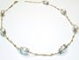 Natural Colored 7.0mm Akoya Pearls Set in a 14K Yellow Gold Hand-Crafted Open Rollo Link Necklace, Enhanced with White Gold Roundels.