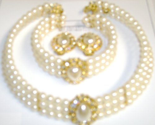 Click here to buy Three Strand Fresh Water Ivory Pearl Choker Necklace Crystals Loaded on Gold Locket Matching....