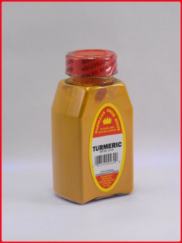 TURMERIC POWDER FRESHLY PACKED IN LARGE JARS, spices, herbs, seasonings