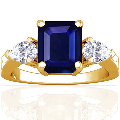 18K Yellow Gold Emerald Cut Blue Sapphire Three Stone Ring
