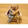 Goldpaar Tortenfigur Brautpaar gold Goldene Hochzeit Brautpaar auf Sofa gold