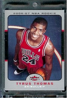 2006-07 Fleer ##201 Tyrus Thomas Chicago Bulls Basketball Rookie Card - Mint Condition - In Protective Display Case ! Basketball Rookie Card - Mint Condition - In Protective Display Case !