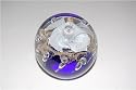 Cobalt blue base paperweight with gold leaf layer & white flower