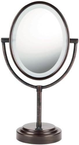Conair - Double-Sided Lighted Mirror (Oiled Bronze) *** Product Description: Conair - Double-Sided Lighted Mirror (Oiled Bronze) Oval Double-Sided Illuminated Mirror 7" X 9.5" Oval Design Rotates 360 For Regular Viewing Or 7X Magnification On/Off ***