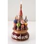MUSICAL CATHEDRAL/St. Basil's Cathedral (Red) [Made in Russia. Size: 7.5 x 3.5 inches (20 x 9.5 cm). Material: wood, gouache, lacquer. A unique Russian souvenir, completely handmade] [This musical cathedral is a model of the church of St. Basil the Blessed. With a turn of the key located on the bottom of the pedestal, it begins to play the famous melody "An Evening Near Moscow." The building itself is painted according to the vibrant turrets of the original cathedral, with white lettering on the pedestal spelling out "" (Russia, in Russian). An entirely hand-crafted work that all will cherish]