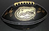 Urban Meyer Autographed Florida Gators Black Leather Football with 06 NAT CHAMPS Inscription