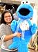UNIQUE 3 and 1/2-Feet-Tall SESAME STREET COOKIE MONSTER BRINGS HIS OWN COOKIE! REAL, GIFT-WRAPPED, GIANT 1/2-POUND COOKIE ATTACHED TO BOW AROUND NECK OF GIANT 42" STUFFED PLUSH COOKIE MONSTER