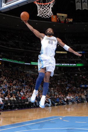 Minnesota Timberwolves v Denver Nuggets: Nene Photographic Poster Print by Garrett Ellwood, 24x36