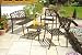 Bronze Metal 4 Piece Bench, Table and 2 Chairs Patio Set - 2 Seater Garden Bench, Table and 2 Carver Arm Chairs With Attractive Cast Iron Floral Feature
